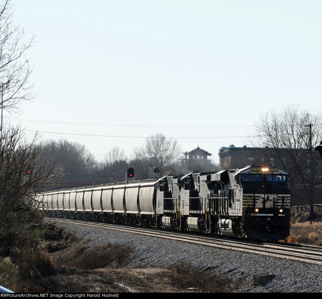 NS 8066 leads train 45J with company hoppers northbound